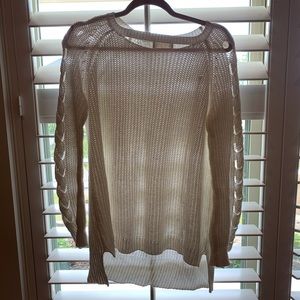 Long white cut out sweater